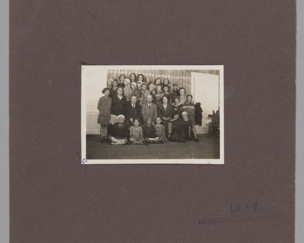 Group photograph from the Orphans' Home (Warsaw, 92 Krochmalna Street), 1923, centre from the right: Stefania Wilczyńska, Janusz Korczak, Dr Izaak Eliasberg; source: Collection of the Museum of Warsaw